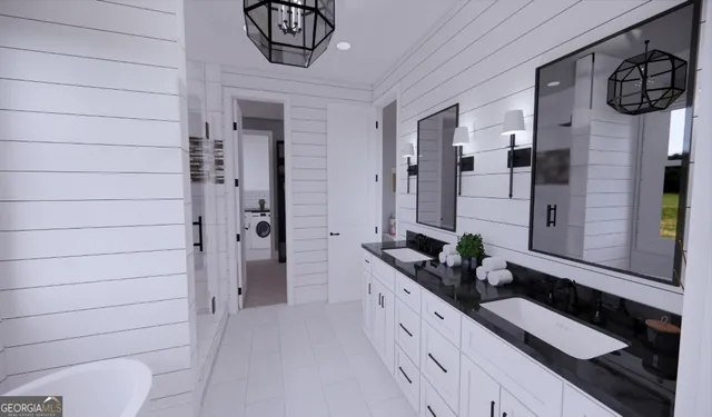 a bathroom with a granite countertop sink a toilet and shower