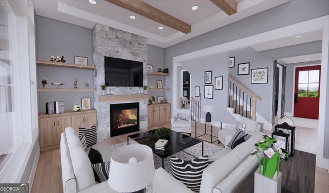 a living room with furniture a flat screen tv and a fireplace