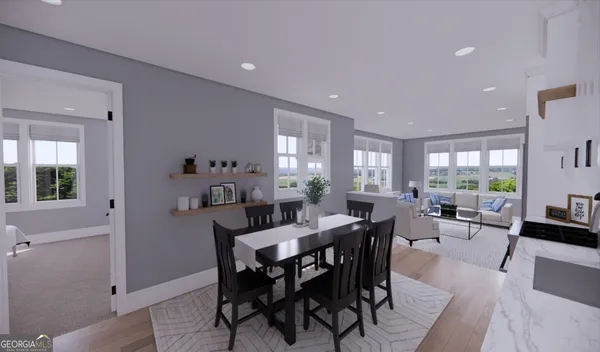a view of a dining room with furniture