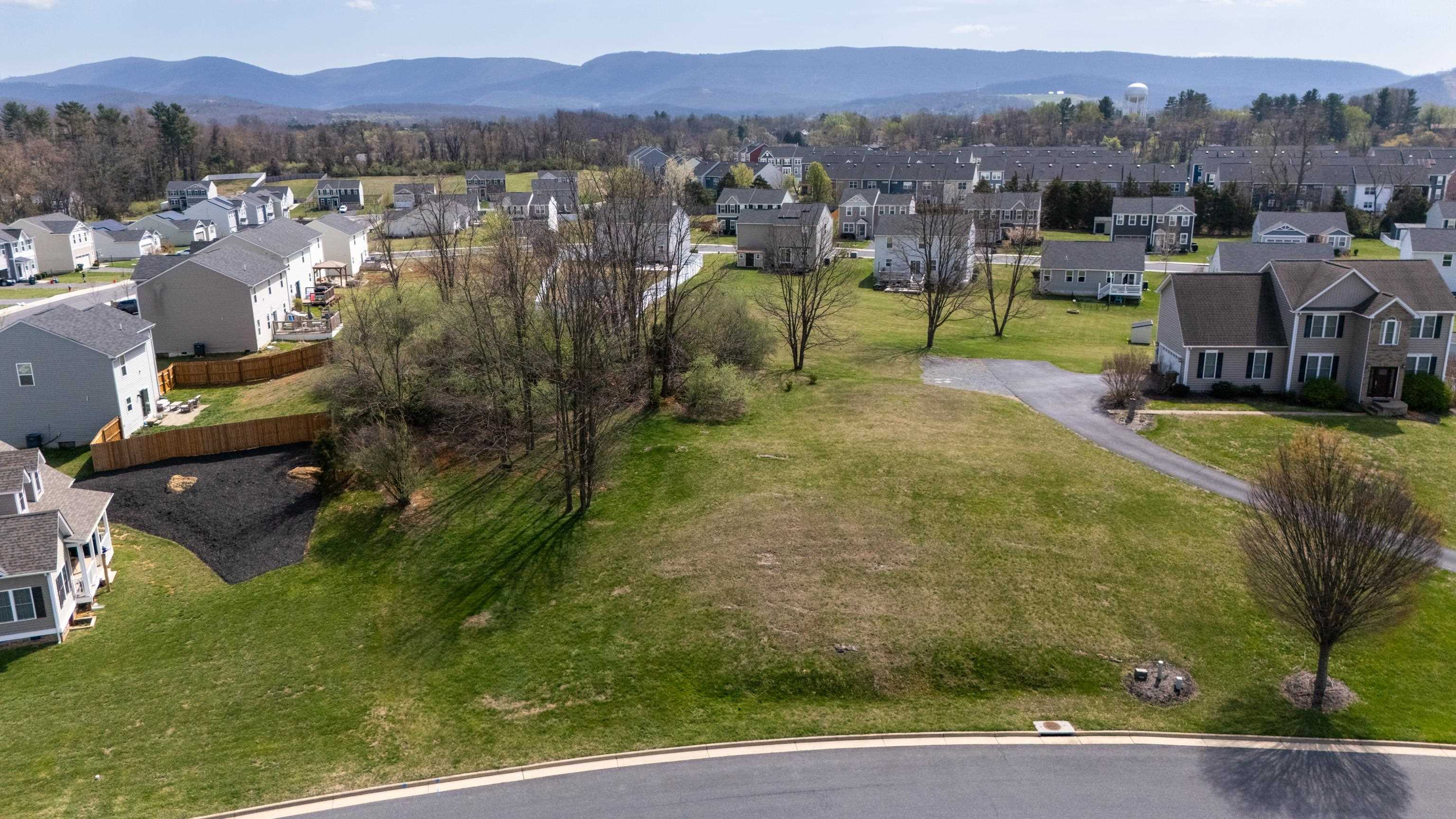 a view of a lake in middle of the town