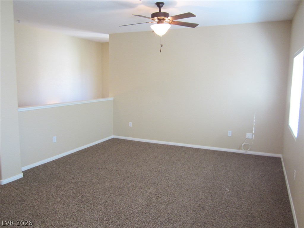 7701 West Robindale Road, Unit 262 Las Vegas, NV 89113 - Photo 7 of 26 A versatile open loft area provides additional flexible living space.