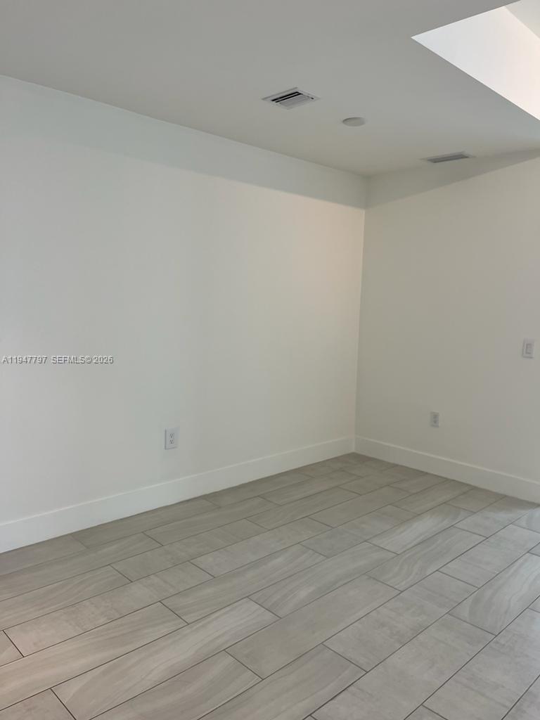 2000 Metropica Way, Unit 1602 Sunrise, FL 33323 - Photo 11 of 50 a view of an empty room