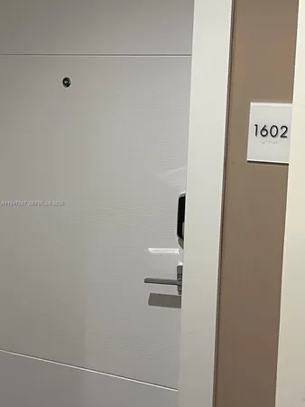 a view of a swimming pool and seating area