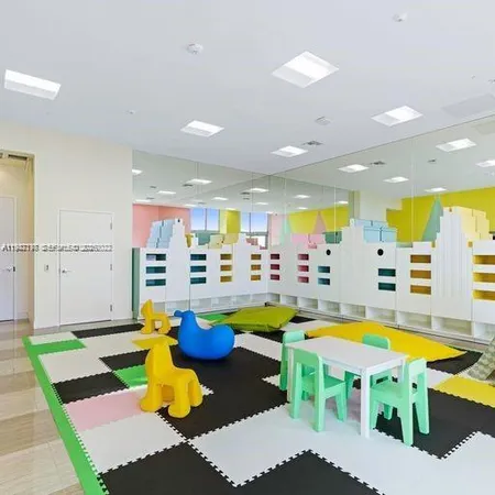 a view of a livingroom with furniture and wooden floor