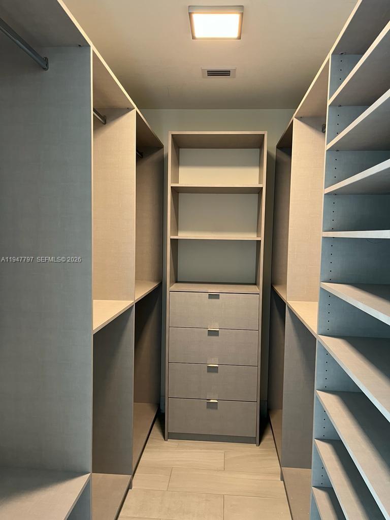 2000 Metropica Way, Unit 1602 Sunrise, FL 33323 - Photo 10 of 50 a view of walk in closet