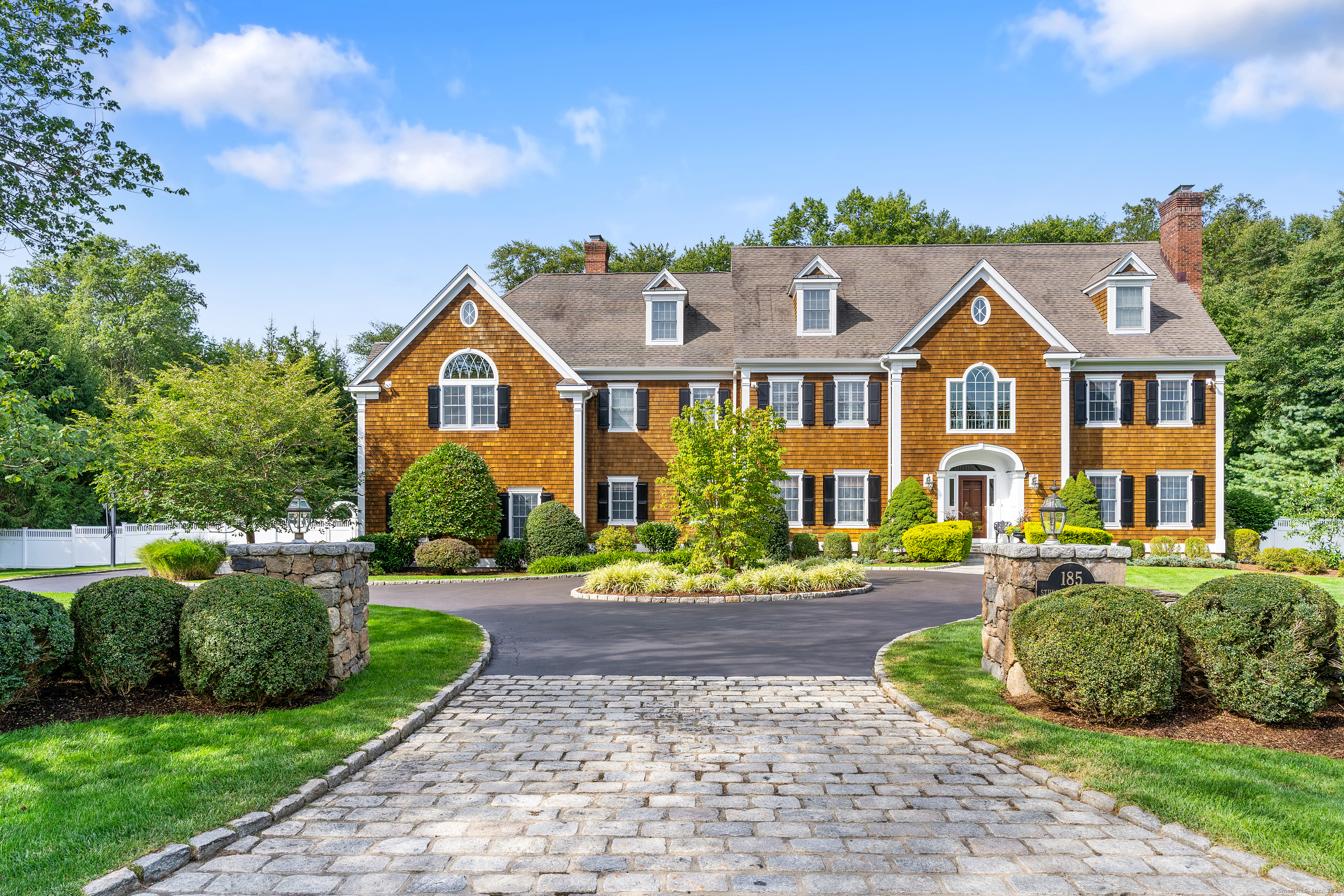 185 Sturges Ridge Road Wilton, CT 06897 - Photo 1 of 1 Handsome natural shingles makes this home stand out, even on prestigious Sturges Ridge Rd.
