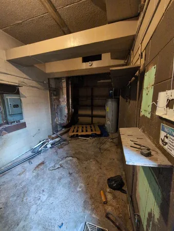 a view of storage and utility room