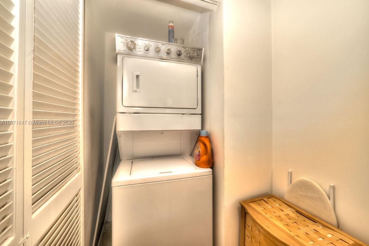 3540 Main Highway, Unit 301 Miami, FL 33133 - Photo 18 of 29 a utility room with dryer and washer