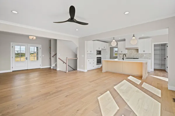 a view of a kitchen with furniture and a kitchen