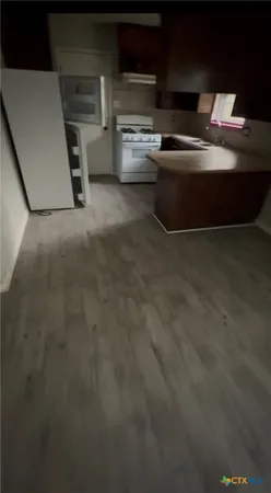 a room with table and chairs