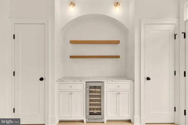 a view of cabinets with wooden floor