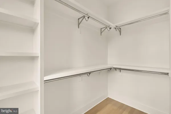 a view of a room with racks on the wall