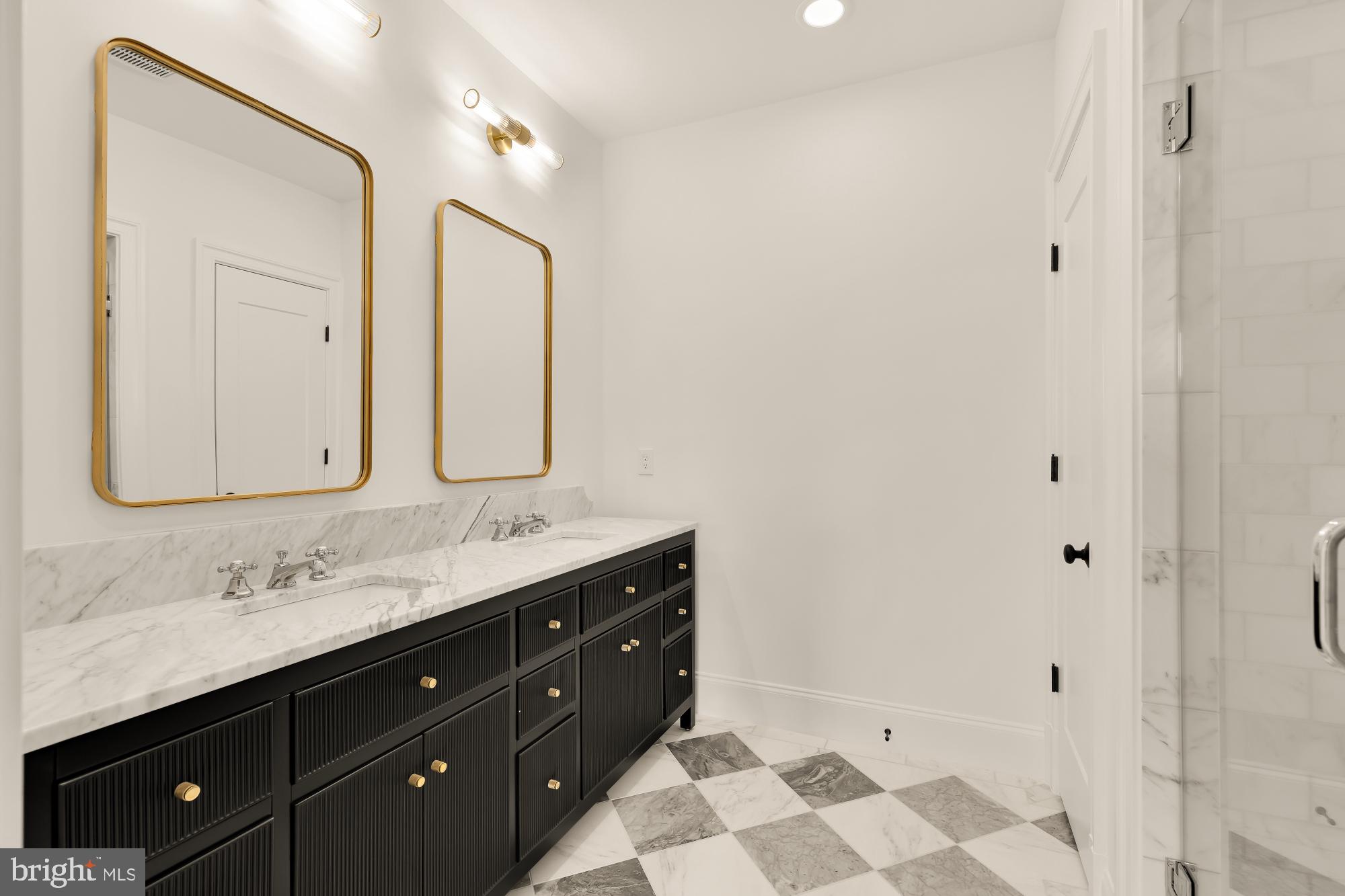 1010 I Street Northeast Washington, DC 20002 - Photo 28 of 51 a bathroom with a double vanity sink mirror and