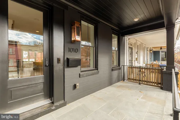 a view of a hallway with a glass door