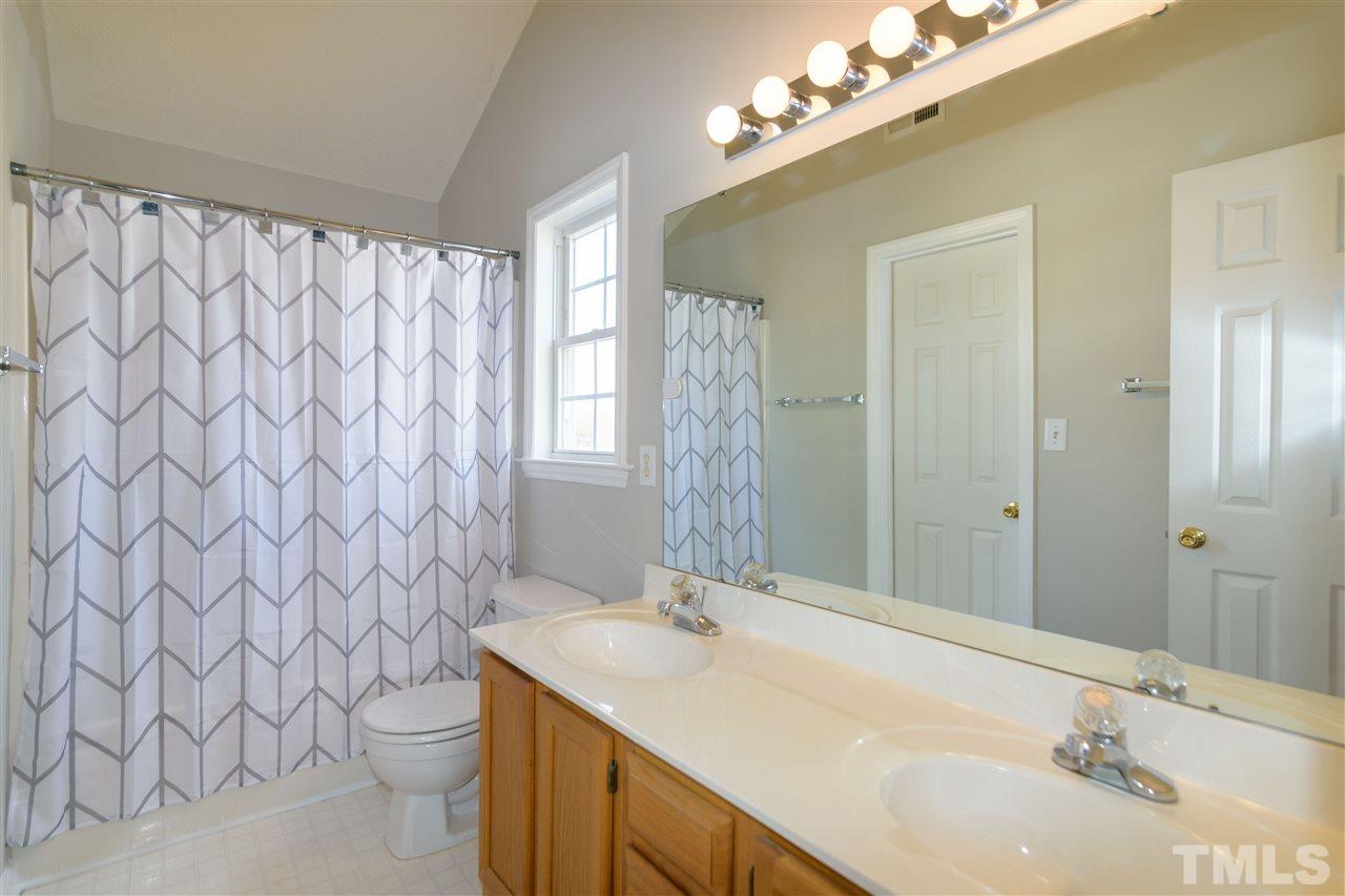 3500 Jaybee Court Raleigh, NC 27604 - Photo 16 of 26 a bathroom with a sink toilet and shower
