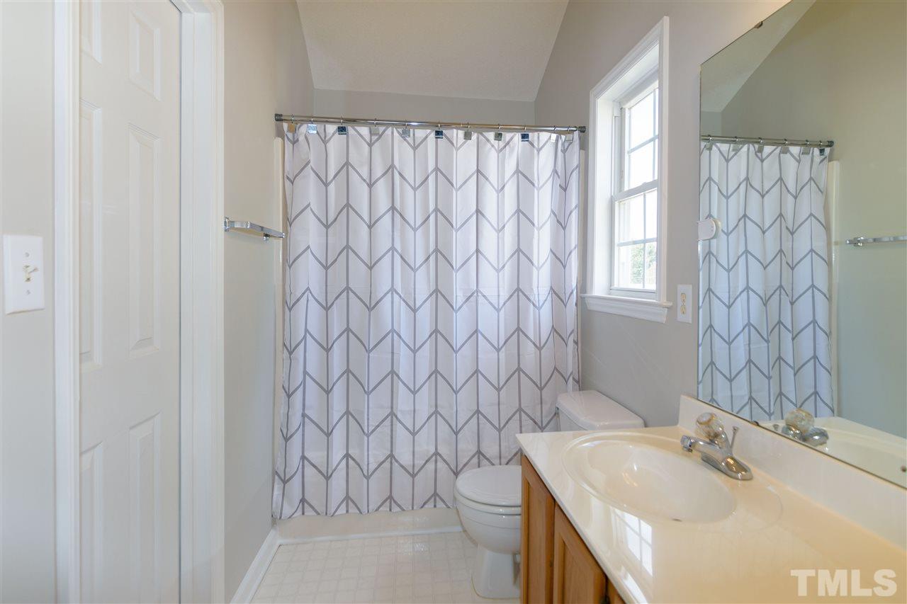 3500 Jaybee Court Raleigh, NC 27604 - Photo 17 of 26 a bathroom with a sink and a tub