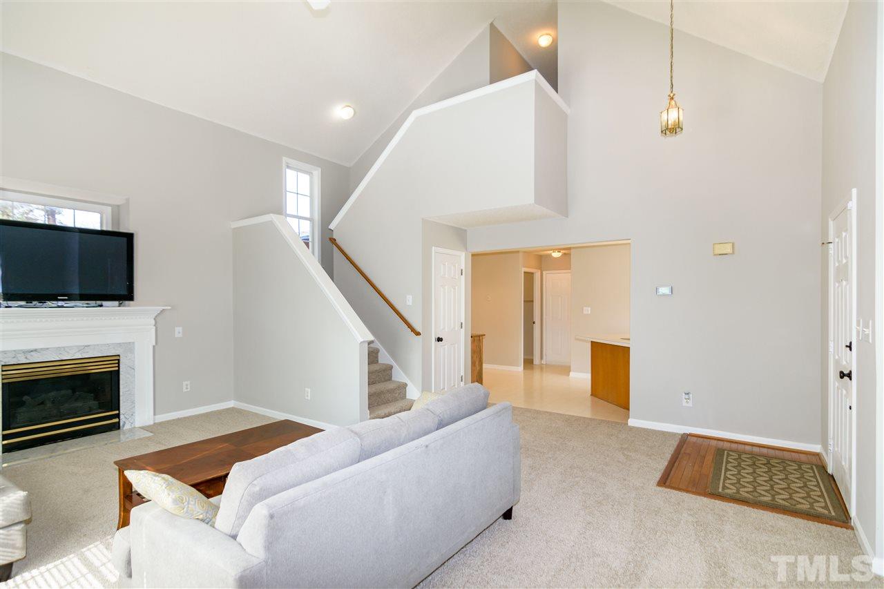 3500 Jaybee Court Raleigh, NC 27604 - Photo 7 of 26 a living room with furniture and a fireplace