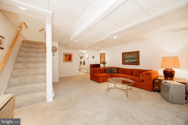 a living room with furniture and a couch