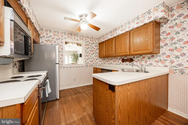 a bathroom with a sink a vanity and a mirror