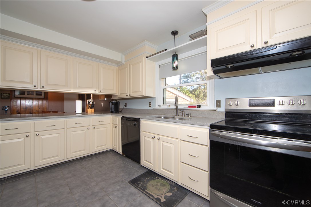 4609 Bruce Road Chester, VA 23831 - Photo 12 of 36 a kitchen with cabinets stainless steel appliances and sink
