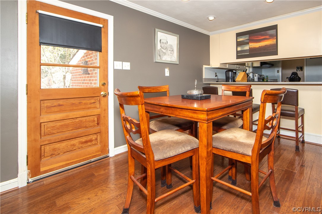 4609 Bruce Road Chester, VA 23831 - Photo 15 of 36 a view of a dining room with furniture and wooden floor