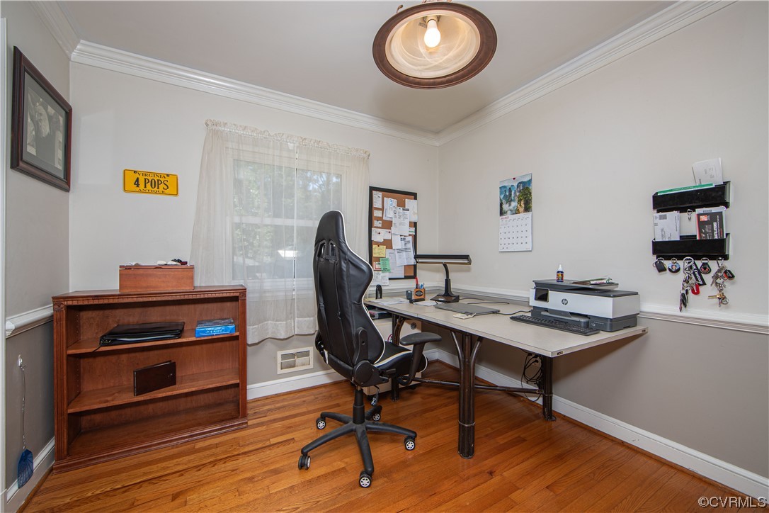 4609 Bruce Road Chester, VA 23831 - Photo 19 of 36 a view of a workspace with furniture and wooden floor
