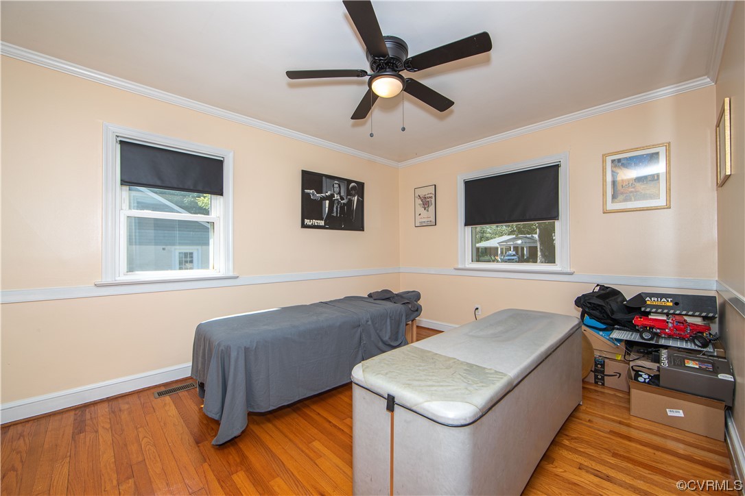 4609 Bruce Road Chester, VA 23831 - Photo 22 of 36 a bedroom with furniture and a window
