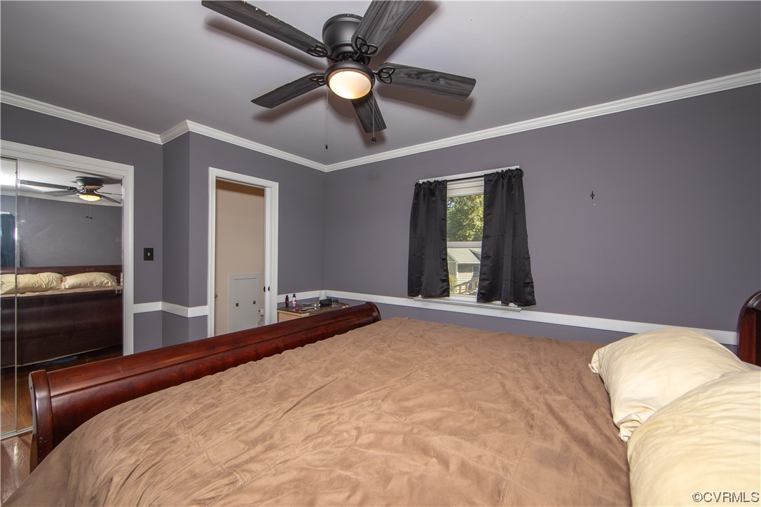 4609 Bruce Road Chester, VA 23831 - Photo 25 of 36 a bedroom with a large bed and a large window