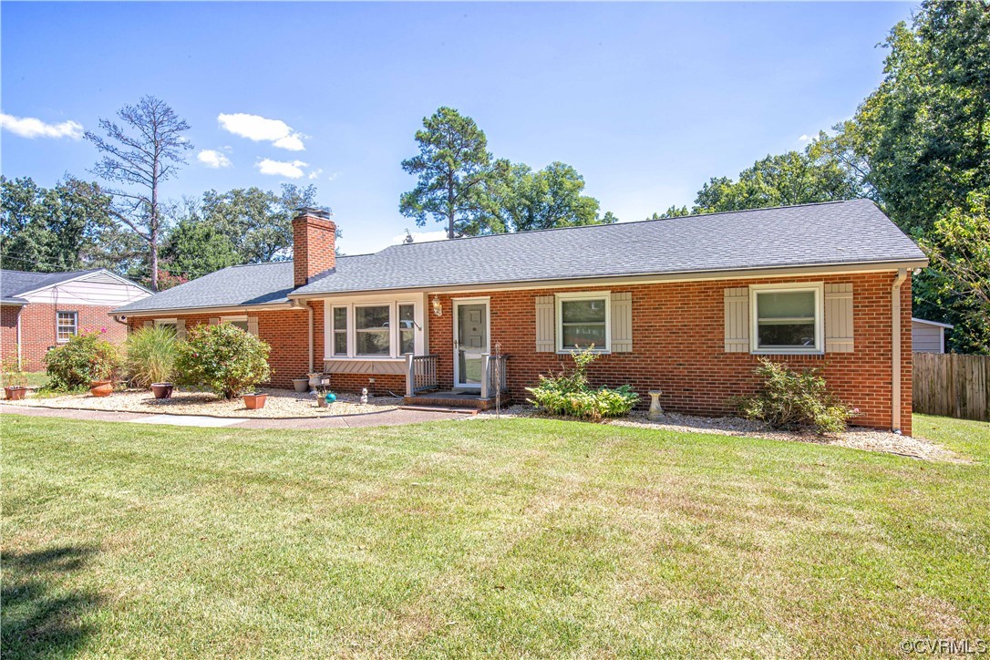 4609 Bruce Road Chester, VA 23831 - Photo 3 of 36 front view of a house with a yard
