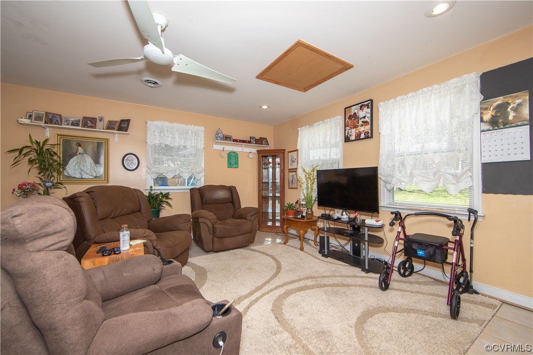 4609 Bruce Road Chester, VA 23831 - Photo 31 of 36 a living room with furniture and a flat screen tv
