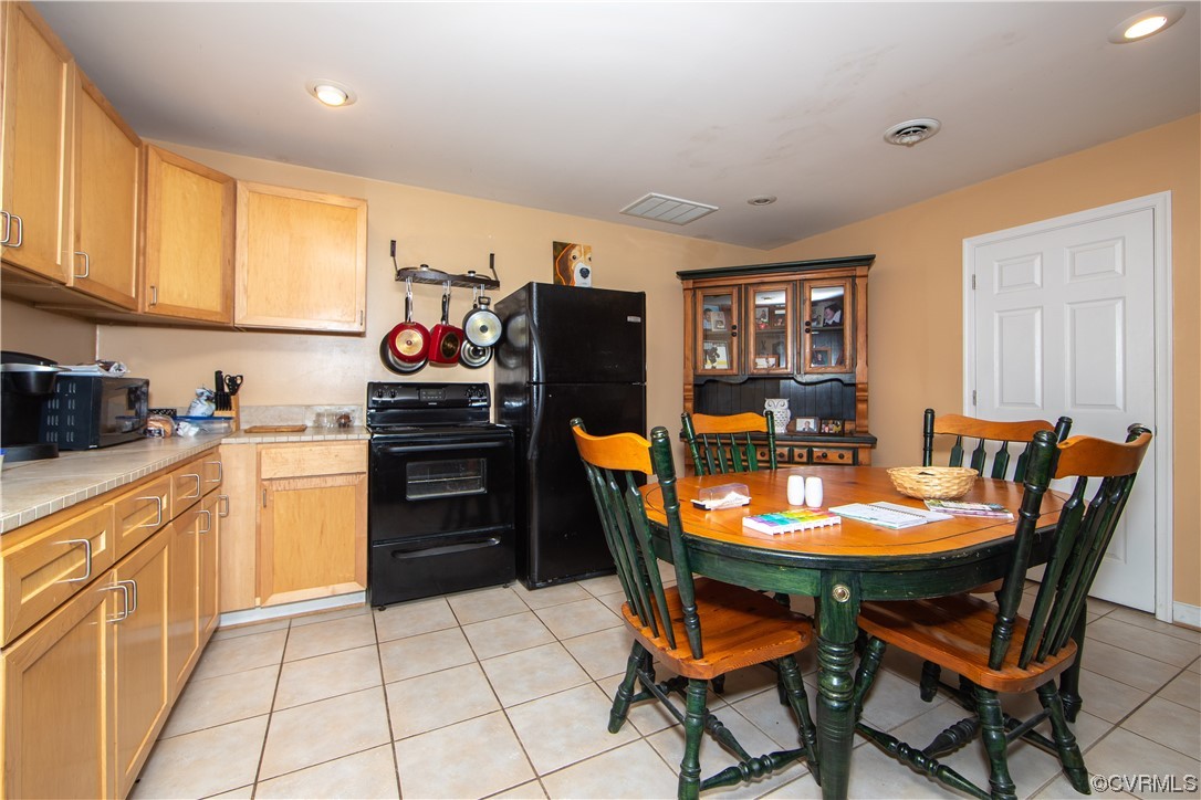 4609 Bruce Road Chester, VA 23831 - Photo 32 of 36 a dining room with furniture and window