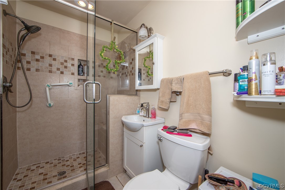 4609 Bruce Road Chester, VA 23831 - Photo 34 of 36 a bathroom with a sink toilet and shower