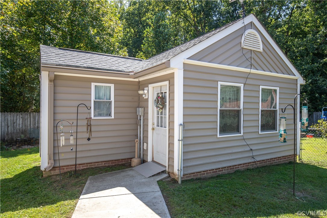 4609 Bruce Road Chester, VA 23831 - Photo 4 of 36 a view of a house with a yard