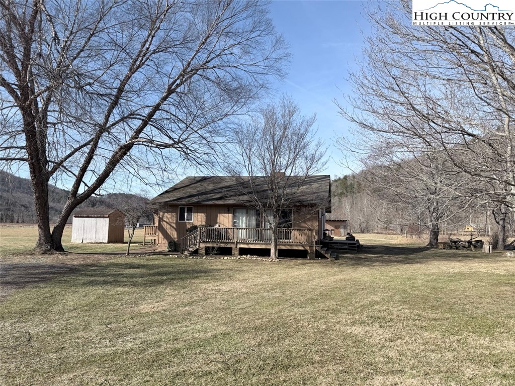 2752 Broadstone Road Banner Elk, NC 28604 - Photo 2 of 24 a front view of a house with a yard
