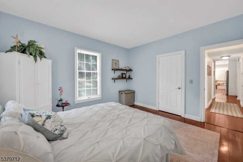 40 Heiser Road Port Murray, NJ 07865 - Photo 24 of 48 a bedroom with a large bed and a potted plant
