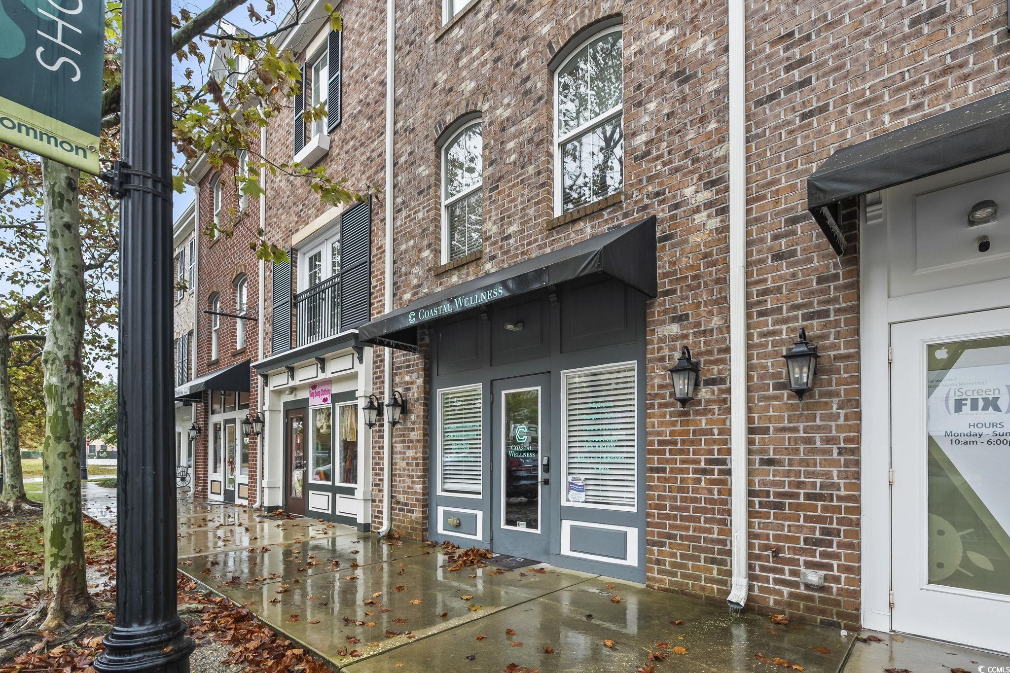 Property entrance with brick siding