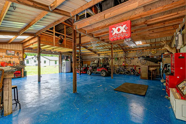 a view of a studio with wooden floor