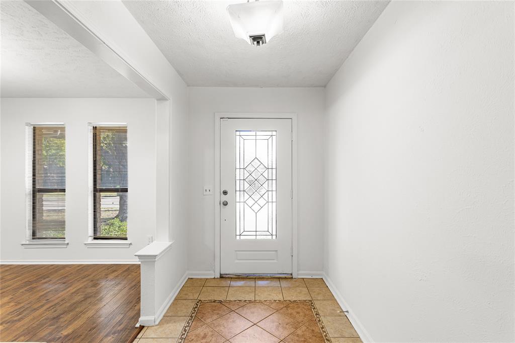 2421 Maple Leaf Drive Plano, TX 75075 - Photo 2 of 18 a view of an empty room with a window