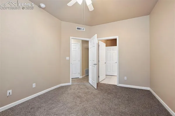 an empty room with a bathroom