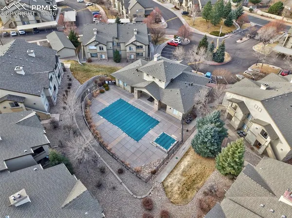 an aerial view of a house with a garden
