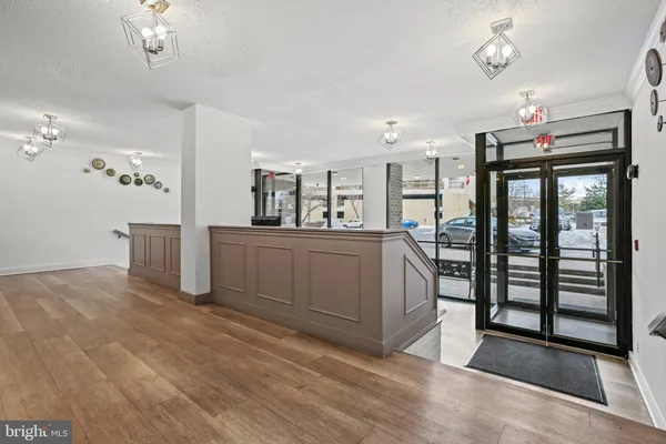 a kitchen with stainless steel appliances refrigerator and cabinets