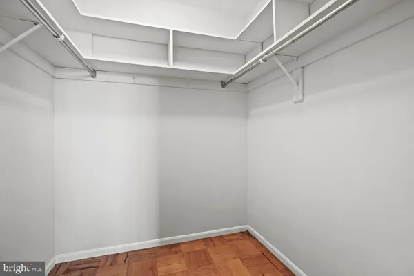 a view of a room with racks on the wall