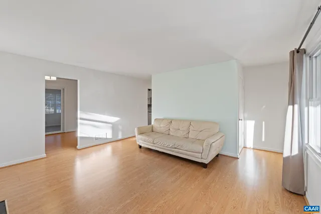 a bedroom with a bed and a fireplace