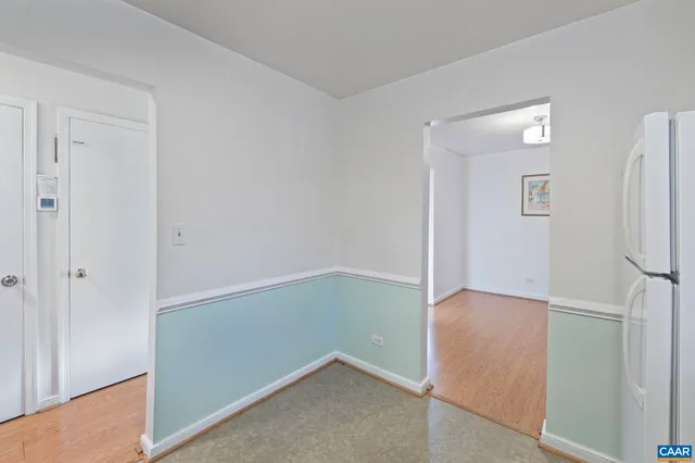 a kitchen with cabinets appliances and a sink