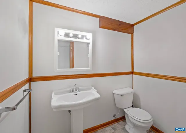 a view of an empty room with storage