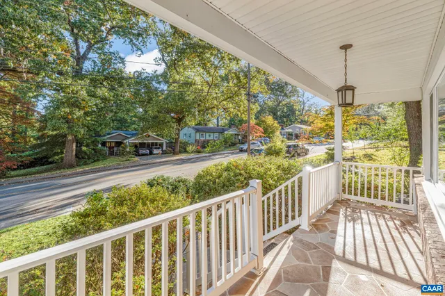 a view of a porch with wooden floor