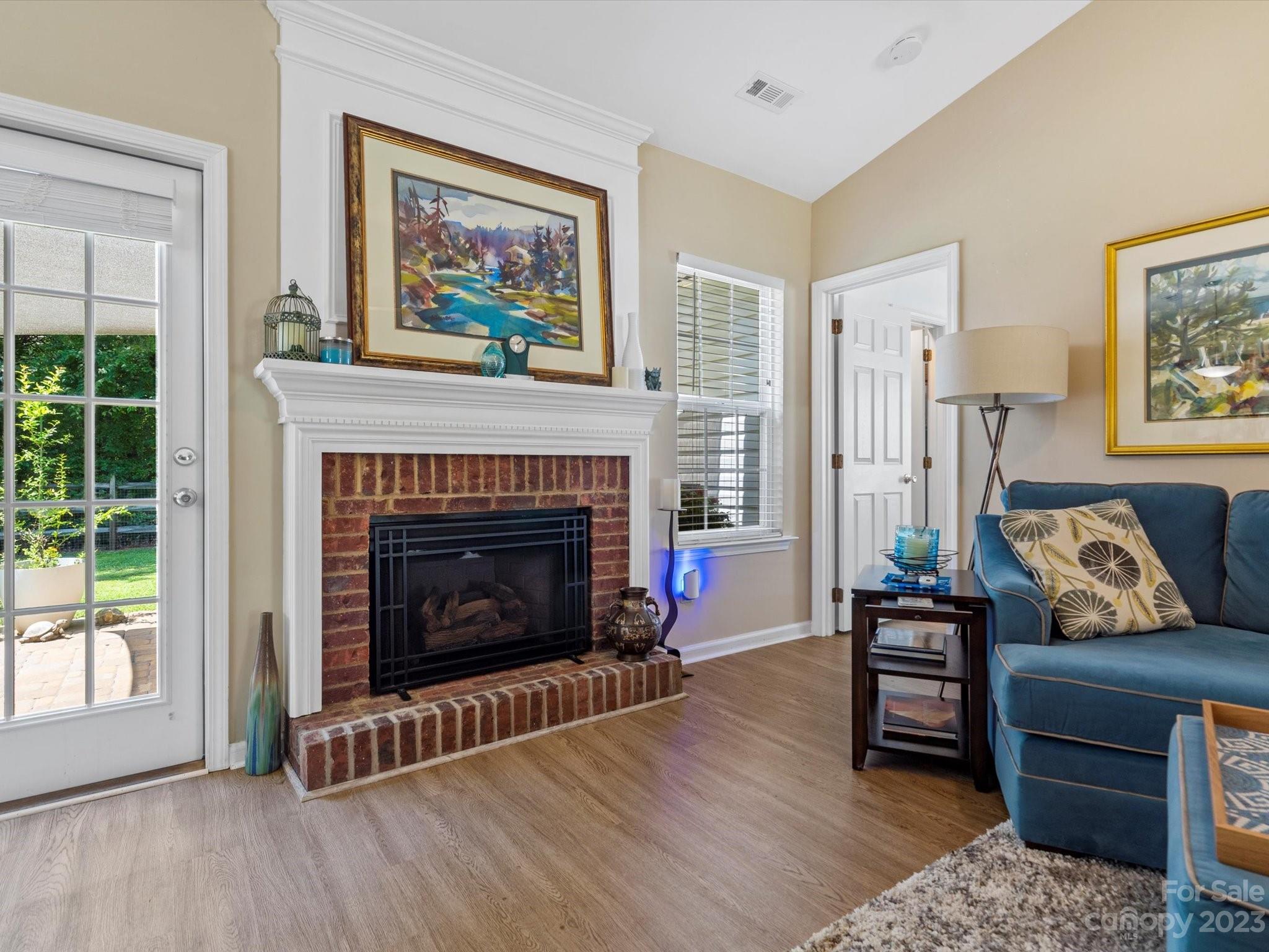 14510 Arbor Ridge Drive Charlotte, NC 28273 - Photo 11 of 34 a living room with furniture and a fireplace