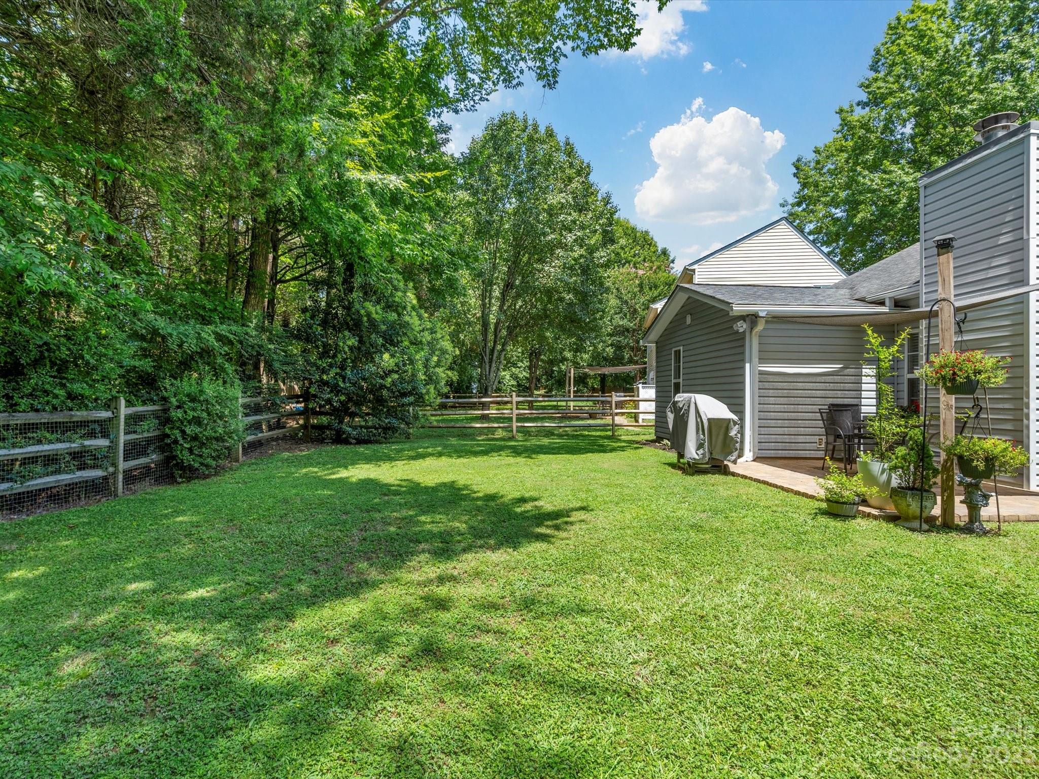 14510 Arbor Ridge Drive Charlotte, NC 28273 - Photo 29 of 34 a view of a house with backyard