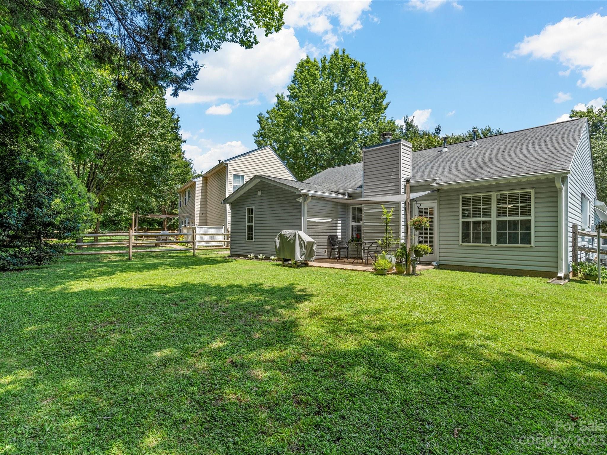 14510 Arbor Ridge Drive Charlotte, NC 28273 - Photo 30 of 34 a front view of house with a garden and porch