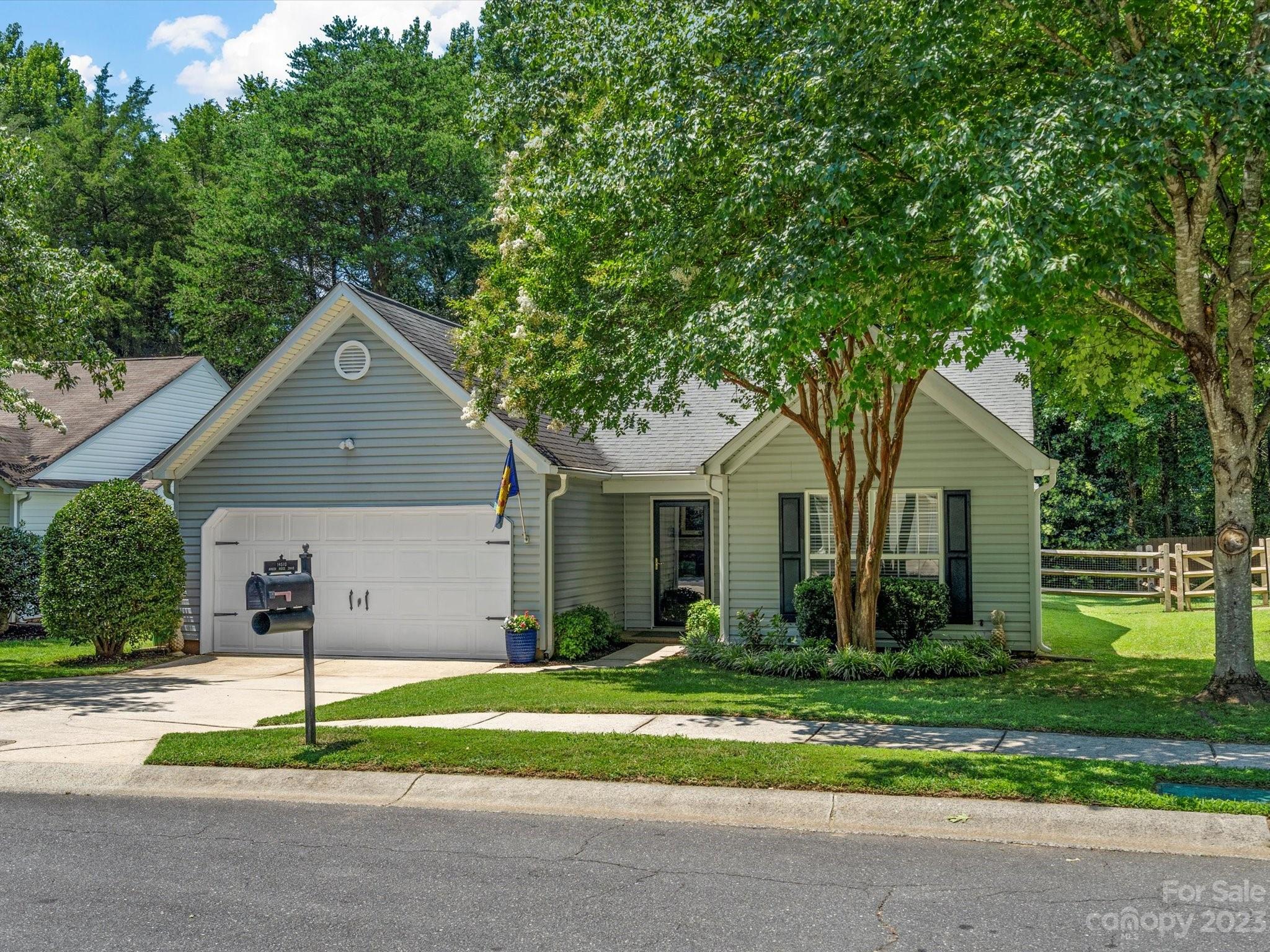 14510 Arbor Ridge Drive Charlotte, NC 28273 - Photo 3 of 34 a house that has a tree in front of it